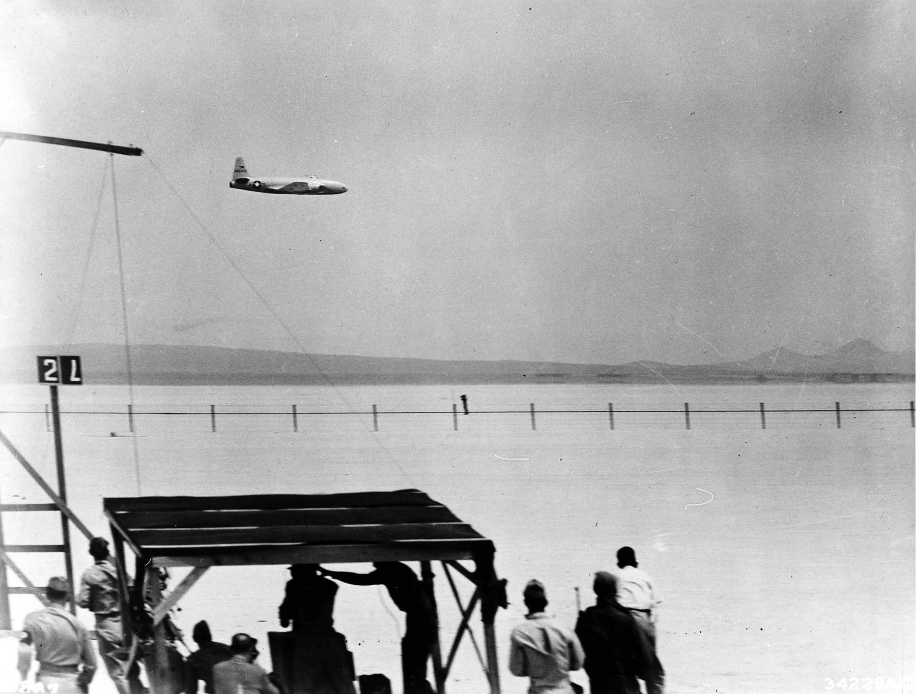Col. Albert Boyd flying the P-80R past a speed marking station at Muroc Army Air Field on  June 19, 1947, setting a new world’s speed record of 623.753 mph.