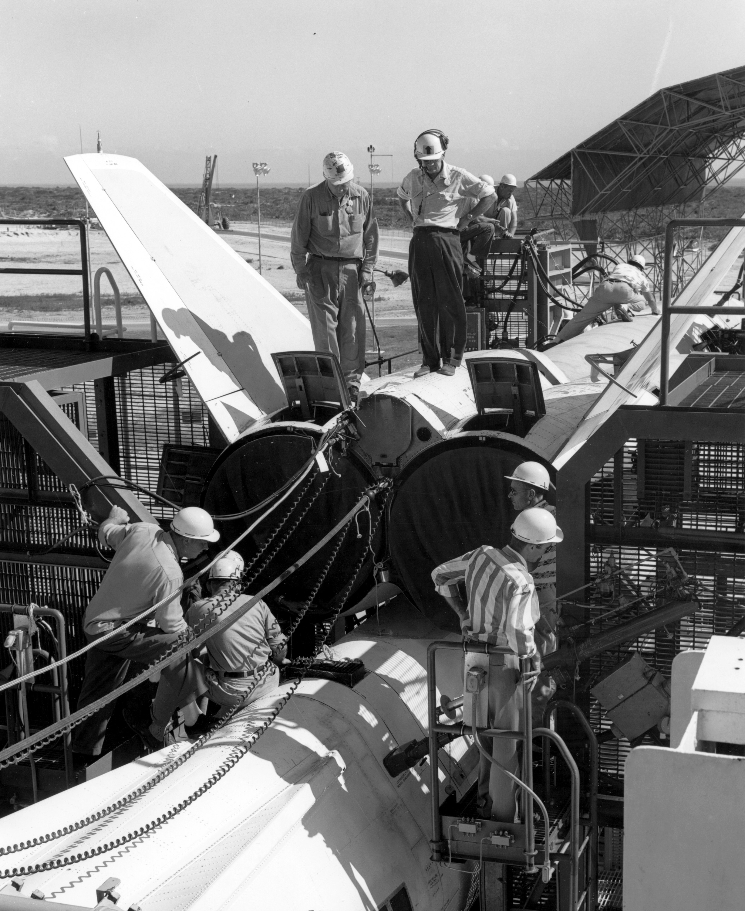  NAA technicians put in long hours over several months in preparation for the first Navaho launch out of the Cape. Technical difficulties delayed the launch until March of 1957.