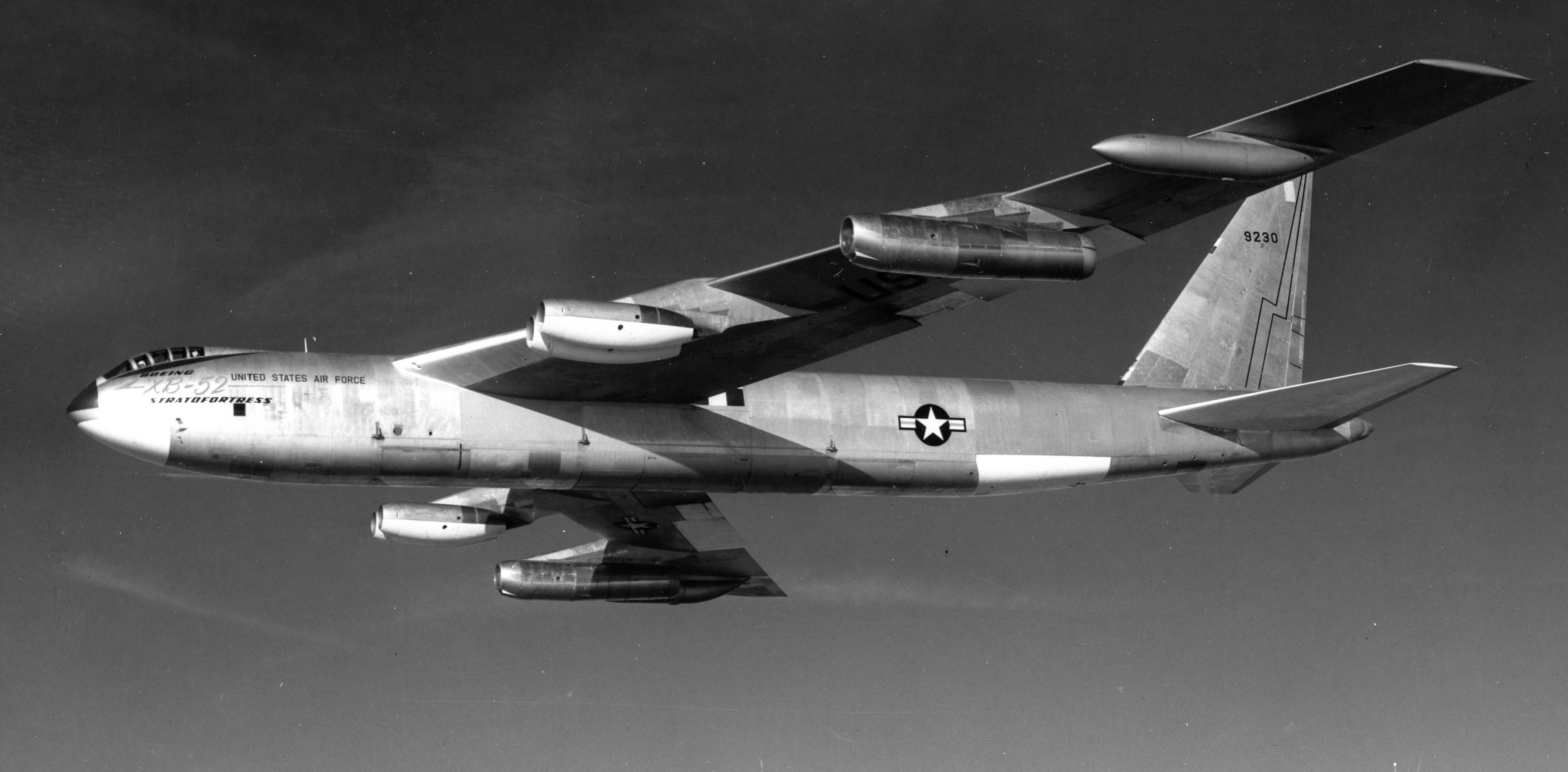 The Boeing prototype XB-52 was utilized for a series of tests utilizing an afterburner-equipped J75 engine on the outboard wing pylons. (Boeing) 